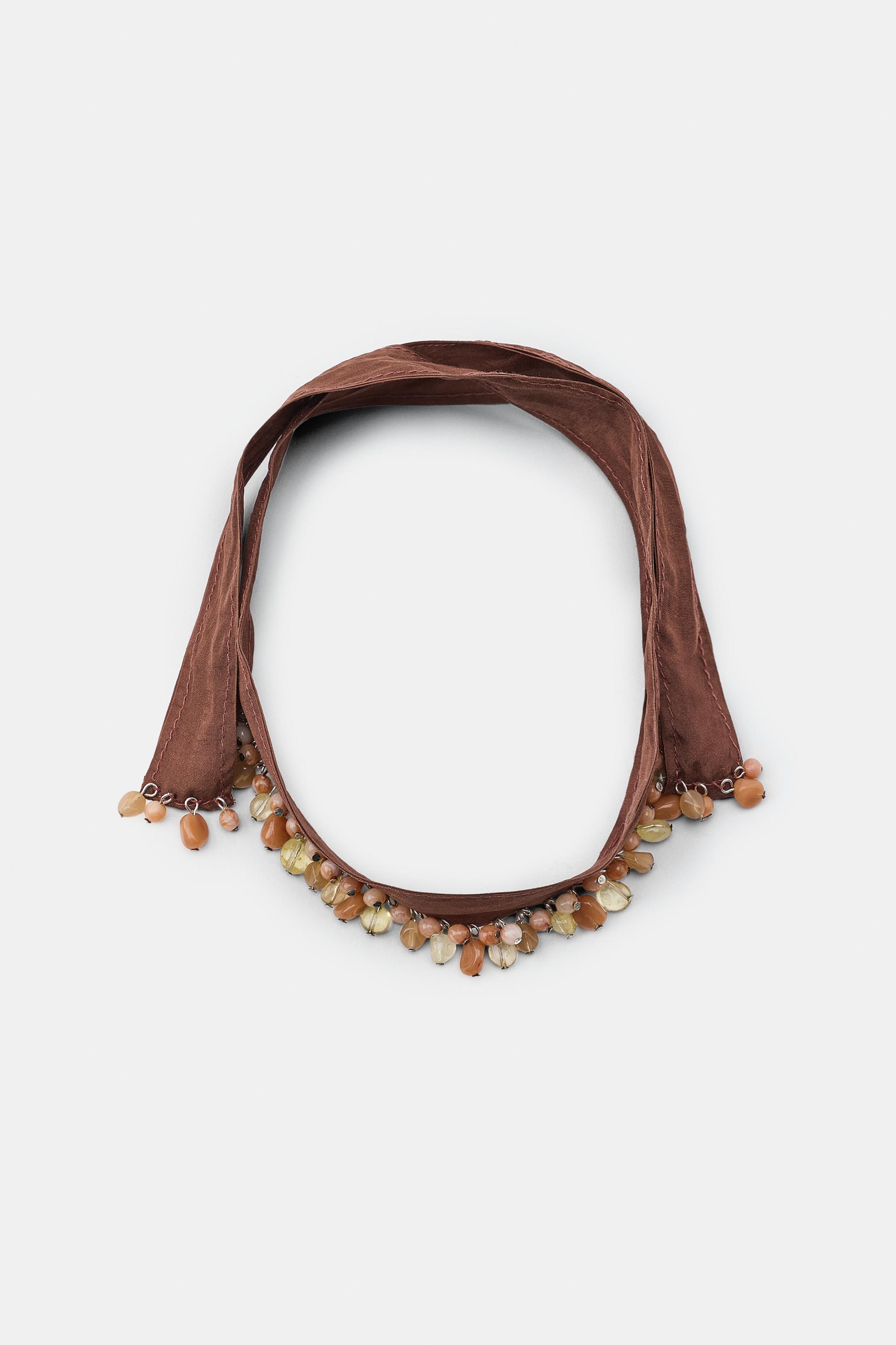 COLLIER RAS-DE-COU EN TISSU À PIERRES